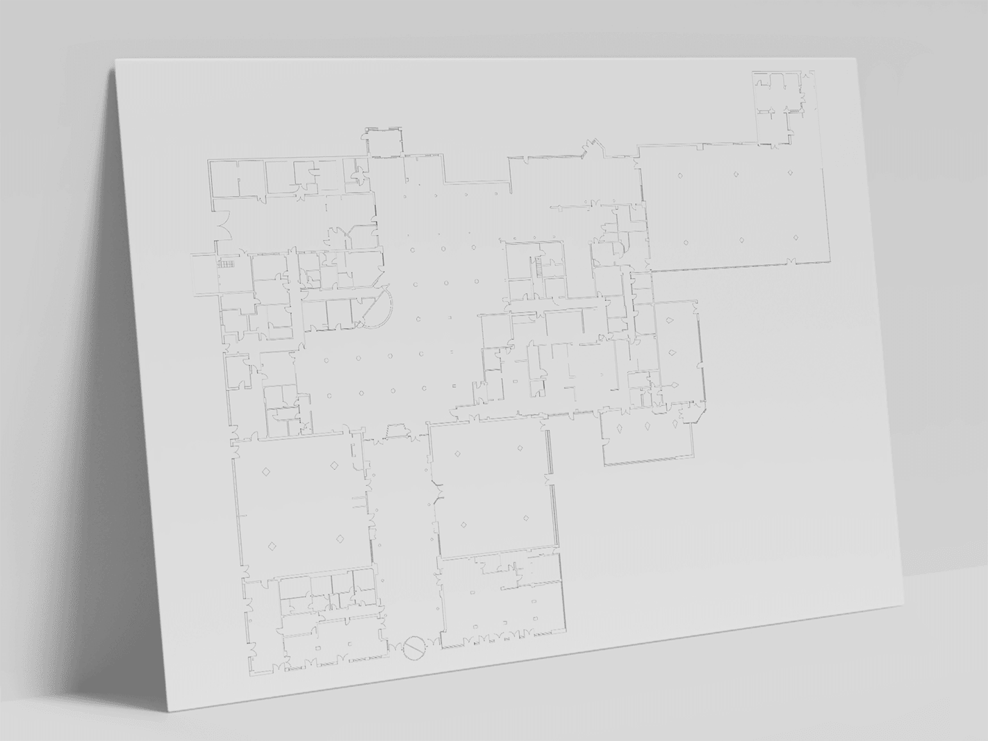 Floor plan of the hotel complex on cardboard, leaning upright against a wall